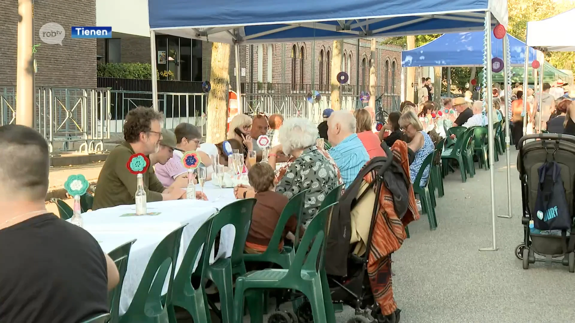 Meer dan 300 mensen eten samen op de Langste Eettafel in Tienen: "Als mensen elkaar niet tegenkomen, heb je geen stad"