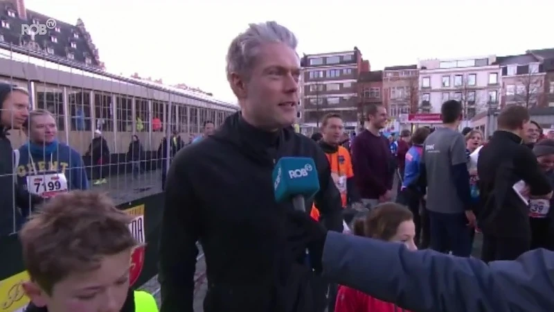 Sportjournalist Maarten Vangramberen loopt de 4 kilometer met zijn familie