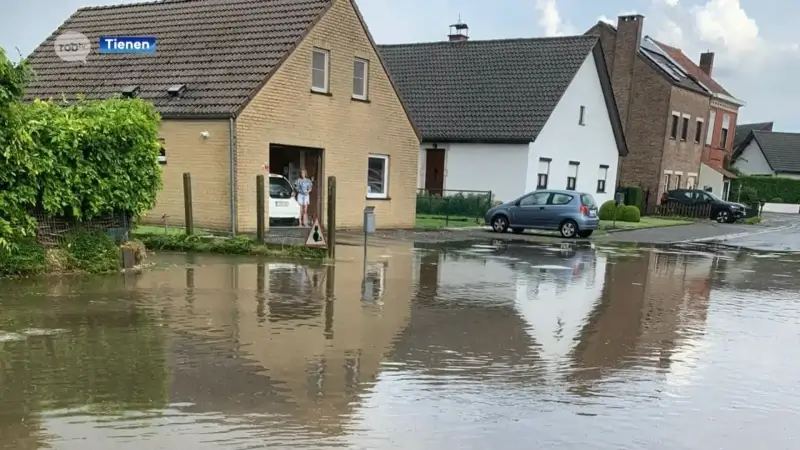 Daalstraat in Kumtich weeral onder water, inwoners zijn het beu: "Als het regent, houdt de buurt haar hart vast"